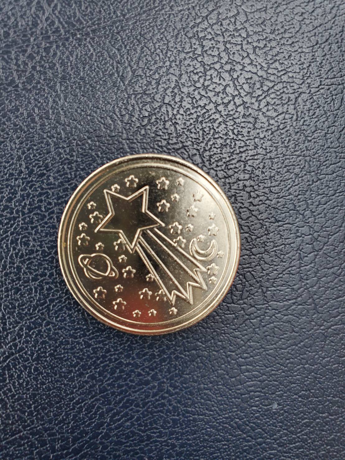 オリジナルデザインの専用コインの写真